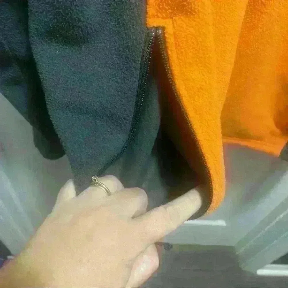 The North Face - orange and gray fleece jacket